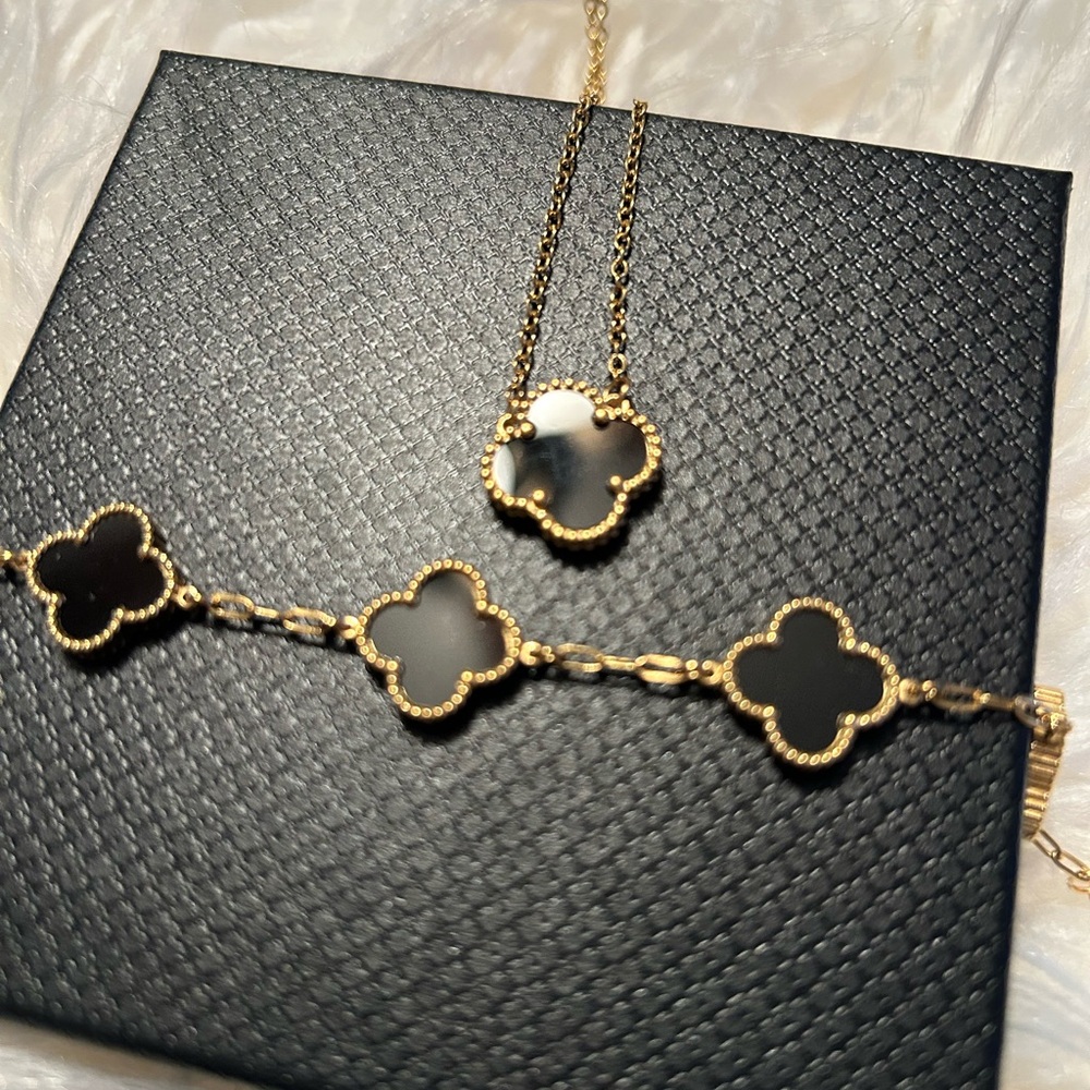 Elegant Gold and Black Clover Necklace and Bracelet